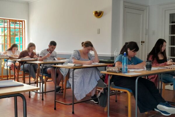 Students learning in a classroom during Equilibria’s gap year program