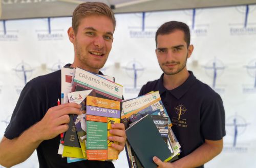 Students exploring career options with books during the Equilibria gap year program