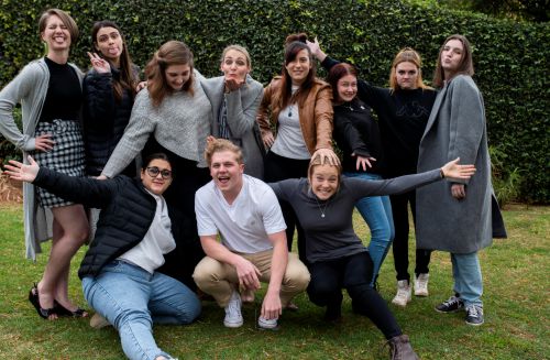 Students gathering outdoors during the Equilibria Christian gap year in Potchefstroom